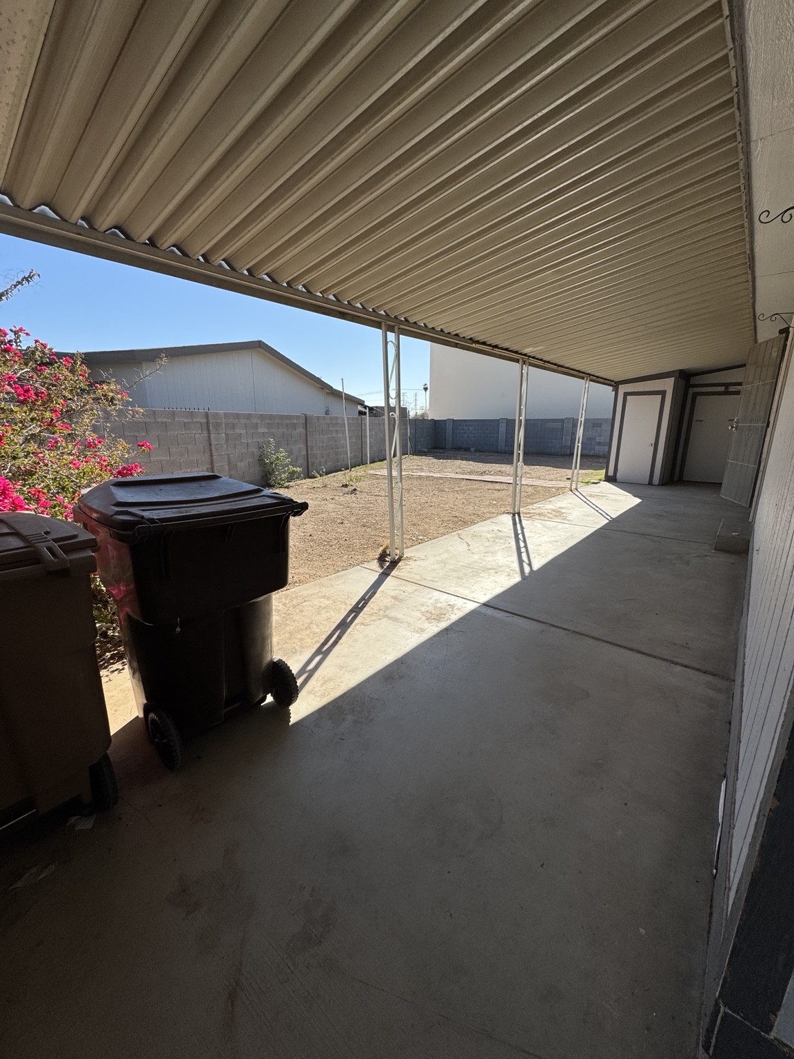 Cleaned patio and yard after a True Demo project